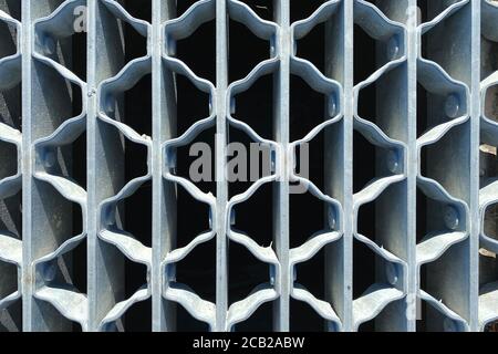 grey painted looking through metal warehouse stairs step suitable for website marketing background backdrop setting architecture architectural layout Stock Photo