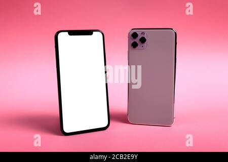 Mockup smartphone blank screen. Modern smart phone device with clean white display touch screen as copy space. Stock Photo