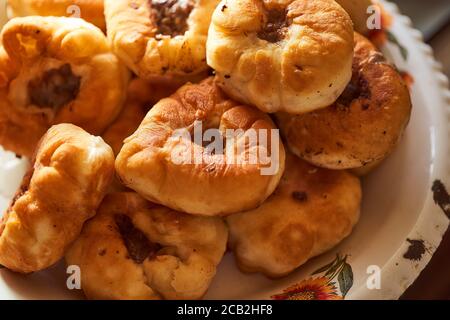 Homemade Meat pies. The traditional Kazakh, Tatar and Bashkir food - belyashi.  Stock Photo