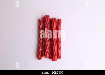 High angle shot of a bunch of stick candies isolated on a white surface Stock Photo