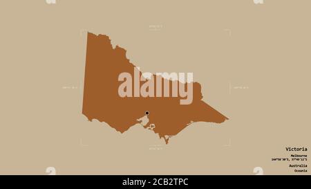 Area of Victoria, state of Australia, isolated on a solid background in a georeferenced bounding box. Labels. Composition of patterned textures. 3D re Stock Photo