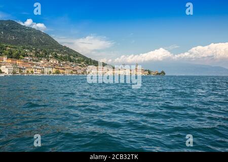 coast at lake garda,  Salo village, italy, wmall and old town with a church, boat view Stock Photo