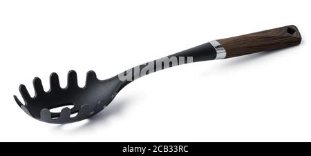 Black plastic spoon for draining on white background Stock Photo