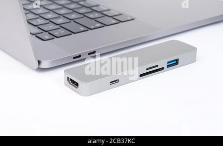 Laptop adapter, universal, with USB, HUB, SD ports Stock Photo