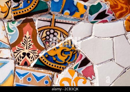 Antonio Gaudi's mosaic tile bench at Park Guell in Barcelona, Spain. Trencadis is a type of mosaic using broken tile, Catalan Modernism. Stock Photo