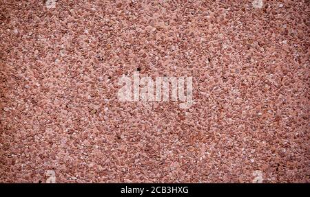 Wall background. Decorative marble chip plaster wall, outside. Mosaic plaster  Stock Photo