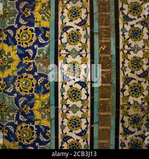 Ceramic wall texture with painted colorful patterns Stock Photo