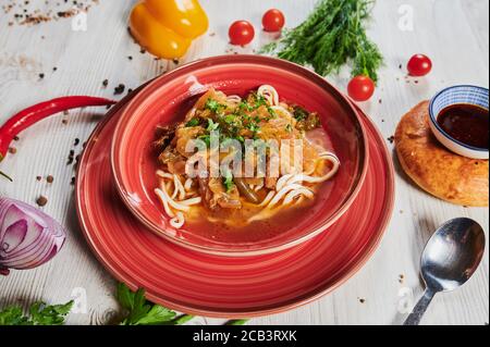 Lagman or Laghman is a Central Asian Dish of Pulled Homemade Noodles, Prepared from a Stringy Dough with a Special Recipe. Traditional Thick Warming Stock Photo