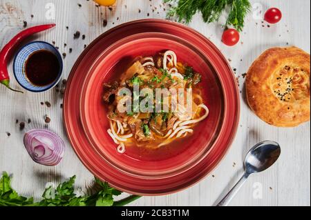 Lagman or Laghman is a Central Asian Dish of Pulled Homemade Noodles, Prepared from a Stringy Dough with a Special Recipe. Traditional Thick Warming Stock Photo