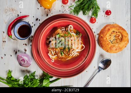 Lagman or Laghman is a Central Asian Dish of Pulled Homemade Noodles, Prepared from a Stringy Dough with a Special Recipe. Traditional Thick Warming Stock Photo