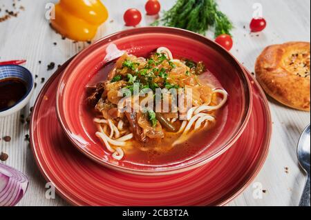 Lagman or Laghman is a Central Asian Dish of Pulled Homemade Noodles, Prepared from a Stringy Dough with a Special Recipe. Traditional Thick Warming Stock Photo