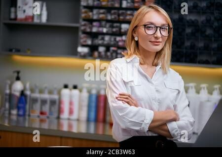 portrait of professional beauty consultant ready to give advice connected with beauty and how to take care of appearance Stock Photo