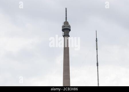 A view of the Arqiva Tower or Emley Moor transmission mast  together with the temporary mast installed in March 2018 to permit main tower maintenance Stock Photo