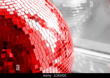 Red Disco ball. Mirror ball. Concept of a night club party, club life. Stock Photo