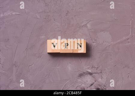 VPN word on wooden block. Business, technology, internet and network concept. Bypass Internet blocks Stock Photo