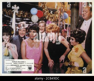 PAULA KELLY SHIRLEY MacLAINE CHITA RIVERA and STUBBY KAYE in SWEET CHARITY 1969 director / choreographer BOB FOSSE writers Neil Simon Peter Stone Federico Fellini music Cy Coleman lyrics Dorothy Fields costumes Edith Head Universal Pictures Stock Photo