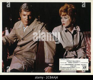 JOHN McMARTIN and SHIRLEY MacLAINE in SWEET CHARITY 1969 director / choreographer BOB FOSSE writers Neil Simon Peter Stone Federico Fellini music Cy Coleman lyrics Dorothy Fields costumes Edith Head Universal Pictures Stock Photo