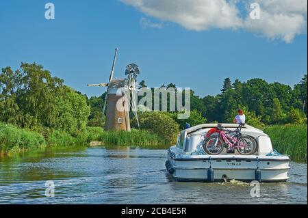 Turf Fen windmill on the banks of the River Ant, Norfolk Broads, Norfolk, England Stock Photo