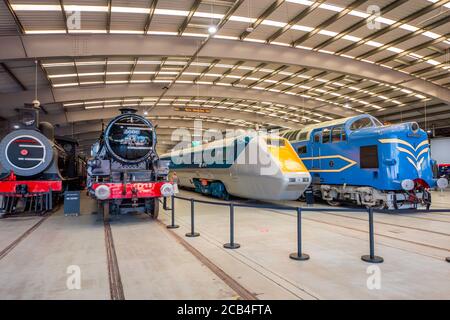 Inside the entrance to the NRM Lcomotion Museum a line up of four locomotives South African railways number 790 LMR no. 5000 the APT-E and a Deltic Stock Photo