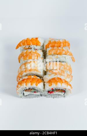 Japanese traditional food. Sushi rolls philadelphia classic with fresh shrimps and cream cheese and caviar Stock Photo