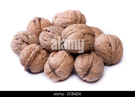 Group of big whole walnuts isolated on white background Stock Photo
