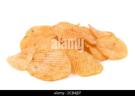 Pile of potato chips fluted isolated on a white background, close-up corrugated crisps Stock Photo