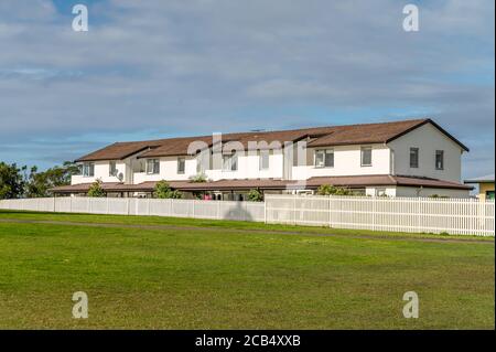 Residential Terraces at Macquarie Lighthouse in Vaucluse on a sunny autumn afternoon Stock Photo