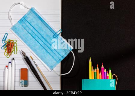 Colored chalk and eraser on wooden desk and chalkboard background Stock  Photo by formatoriginal