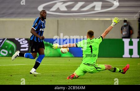 (200811) -- DUSSELDORF, Aug. 11, 2020 (Xinhua) -- Romelu Lukaku (L) of FC Inter shoots during the UEFA Europa League quarterfinal between FC Inter and Bayer 04 Leverkusen in Dusseldorf, Germany, Aug. 10, 2020. FOR EDITORIAL USE ONLY. NOT FOR SALE FOR MARKETING OR ADVERTISING CAMPAIGNS. (Stuart Franklin/UEFA/Getty/Handout via Xinhua) Stock Photo