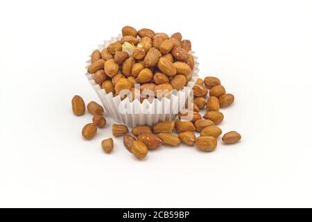 Dessert : salted peanuts in paper cup isolated on white background Stock Photo