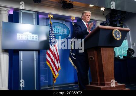 U.S. President Donald Trump (R) ushered by Japanese Emperor Naruhito ...