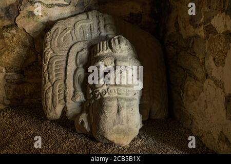 The  head of the statue inTemple 33, probably of Bird Jaguar IV, in the ruins of the Mayan city of Yaxchilan on the Usumacinta River in Chiapas, Mexic Stock Photo