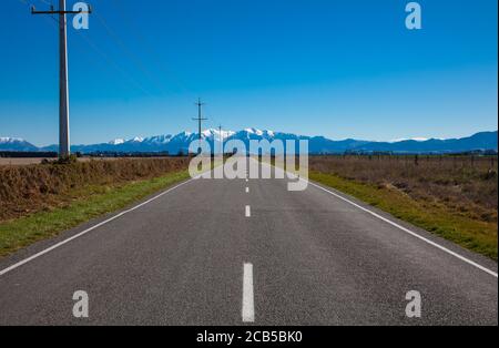 New Zealand Countryside Scenes: Canterbury's straight and flat roads. Stock Photo