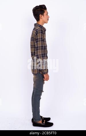 Portrait of young handsome Indian teenage boy Stock Photo