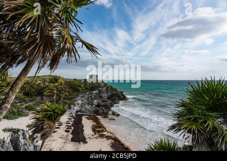 The Temple of the Wind God in the ruins of the Mayan city of Tulum on the coast of the Caribbean Sea.    Tulum National Park, Quintana Roo, Mexico. Stock Photo