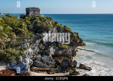 The Temple of the Wind God in the ruins of the Mayan city of Tulum on the coast of the Caribbean Sea.    Tulum National Park, Quintana Roo, Mexico. Stock Photo