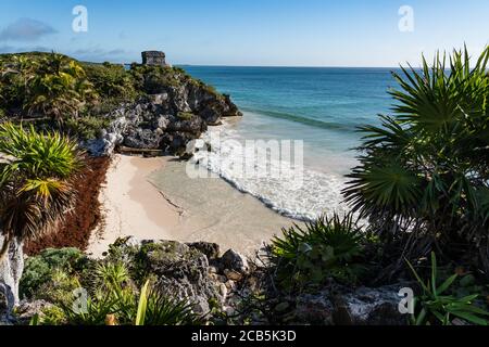 The Temple of the Wind God in the ruins of the Mayan city of Tulum on the coast of the Caribbean Sea.    Tulum National Park, Quintana Roo, Mexico. Stock Photo