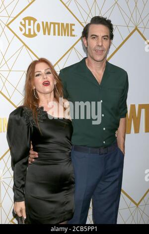 LOS ANGELES - SEP 21:  Isla Fisher, Sacha Baron Cohen at the Showtime Emmy Eve Party at the San Vicente Bungalows on September 21, 2019 in West Hollywood, CA Stock Photo