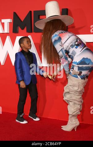 LOS ANGELES - JAN 28:  Auston Jon Moore, Erykah Badu at the 'What Men Want' Premiere at the Village Theater on January 28, 2019 in Westwood, CA Stock Photo