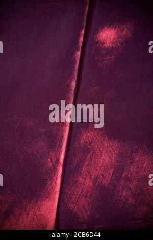 Diagonal Crease on Red Satin Fabric Stock Photo