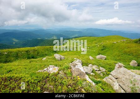 rocks on the hillside. summer mountain landscape on carpathians on a cloudy day Stock Photo