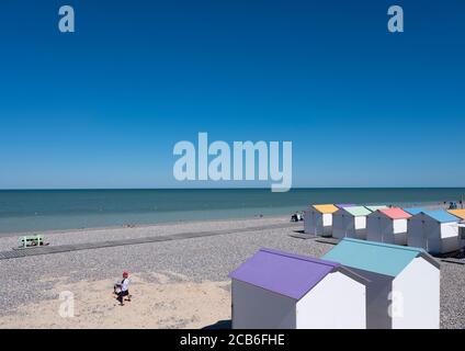 beach and huts at Le Tréport in french normandy on hot summer day Stock Photo