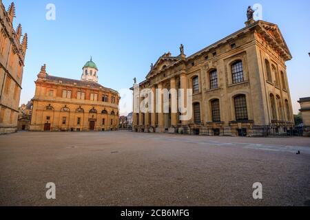 The side of the Sheldonian Theatre and the Clarendon Building with no people around, early in the morning. Oxford, England, UK. Stock Photo