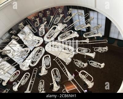 Pressed Silver 'Brass Instruments' Art Installation Stock Photo