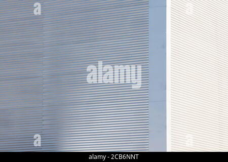 Urban abstract architecture. Close of a metallic building facade isolated. Stock Photo