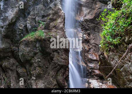 Hiking to the Lainbach Waterfalls near Kochel am See in Bavaria Germany Stock Photo