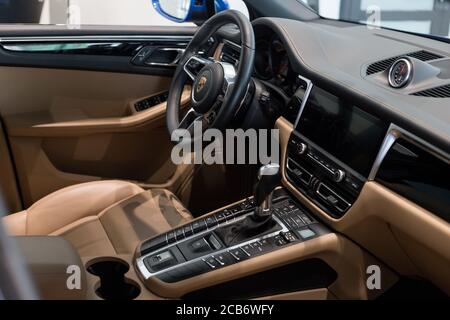 Russia, Izhevsk - August 04, 2020: Porsche showroom. Interior of new modern car Macan S. Famous world brand. Prestigious vehicles. Stock Photo