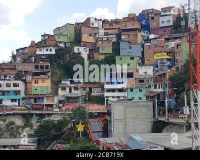 Comuna 13 neighborhood - Medellin city colourful slums (favelas). Medellin, Colombia. Stock Photo