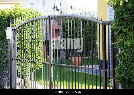 High quality garden fence made with metal bars Stock Photo