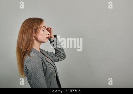 Leaned on hand, falling asleep sad difficulty, emotional problems, Headache, tired head. Unhappy, depression with fingers on forehead, unhealthy, touching temples suffering, stressed. Attractive woman Stock Photo